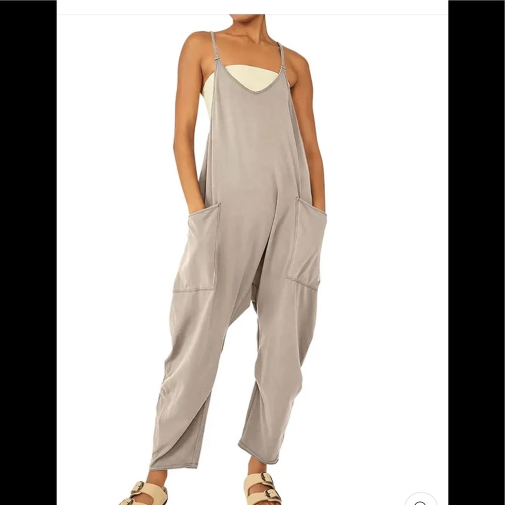 Cream one piece romper. New w/o tags